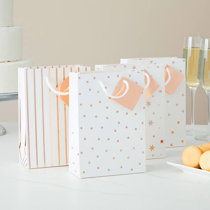 Blue Panda 24 Pack White and Rose Gold Paper Gift Bags for Party, 4 Designs, 7.9x5.5x2.5"