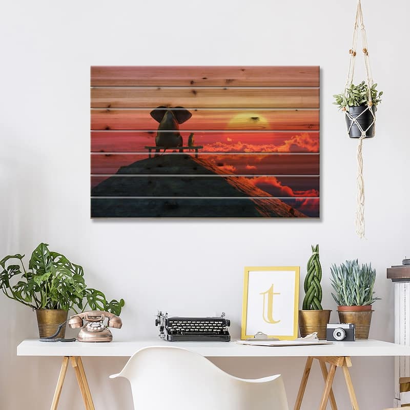 Elephant And Dog Sit On A Mountain Top At Sunset Print On Wood by Mike Kiev - Multi-Color