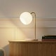 preview thumbnail 1 of 10, Brightech Krystal 14.5 in. Antique Brass Modern LED Arc Desk Lamp with White Glass Globe Shade