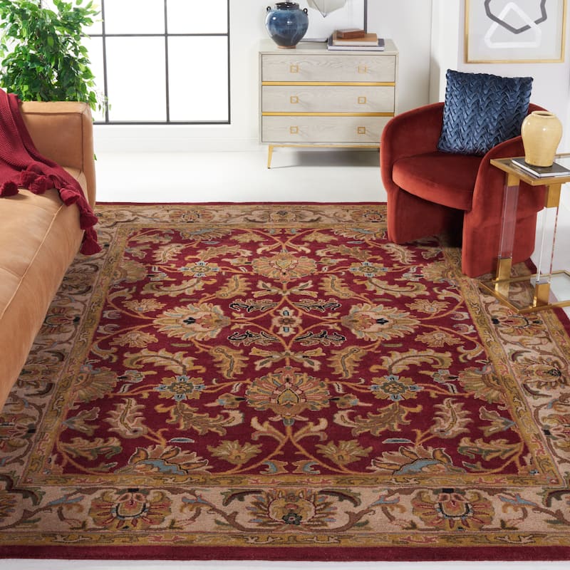 SAFAVIEH Handmade Heritage Lion Traditional Oriental Wool Rug - 6' x 9' - Red/Ivory