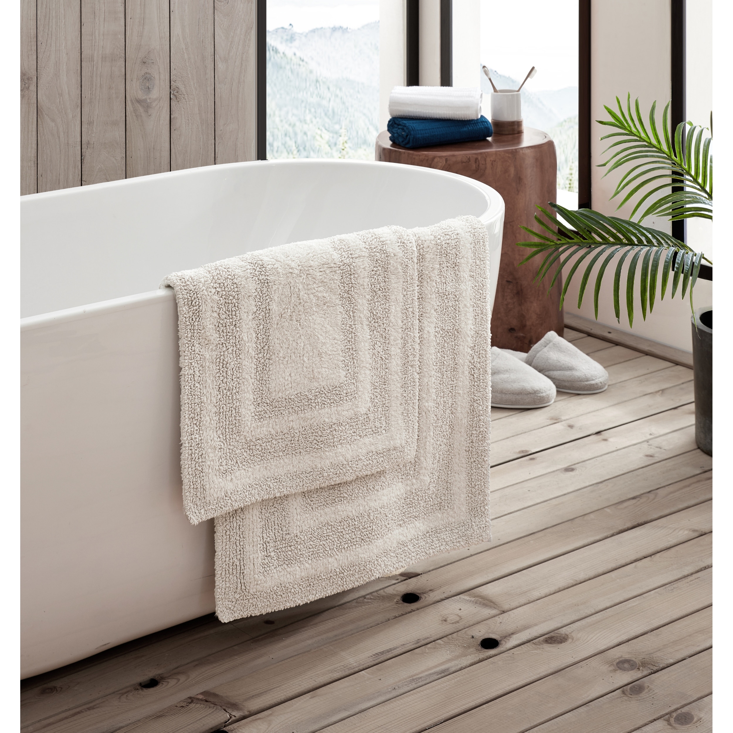 https://ak1.ostkcdn.com/images/products/is/images/direct/8bbf5b7276378b3419e8b2621a56ee76ac98fdb3/Eddie-Bauer-Logan-Cotton-2-Piece-Bath-Rug-Set.jpg