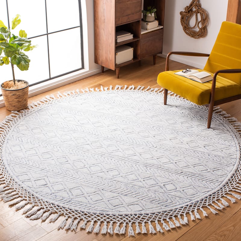 SAFAVIEH Handmade Casablanca Shag Jenney Tribal Wool Rug - 7' Round - Ivory/Blue