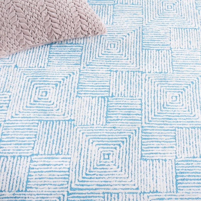 SAFAVIEH Handmade Glamour Nayma Geometric Viscose Rug