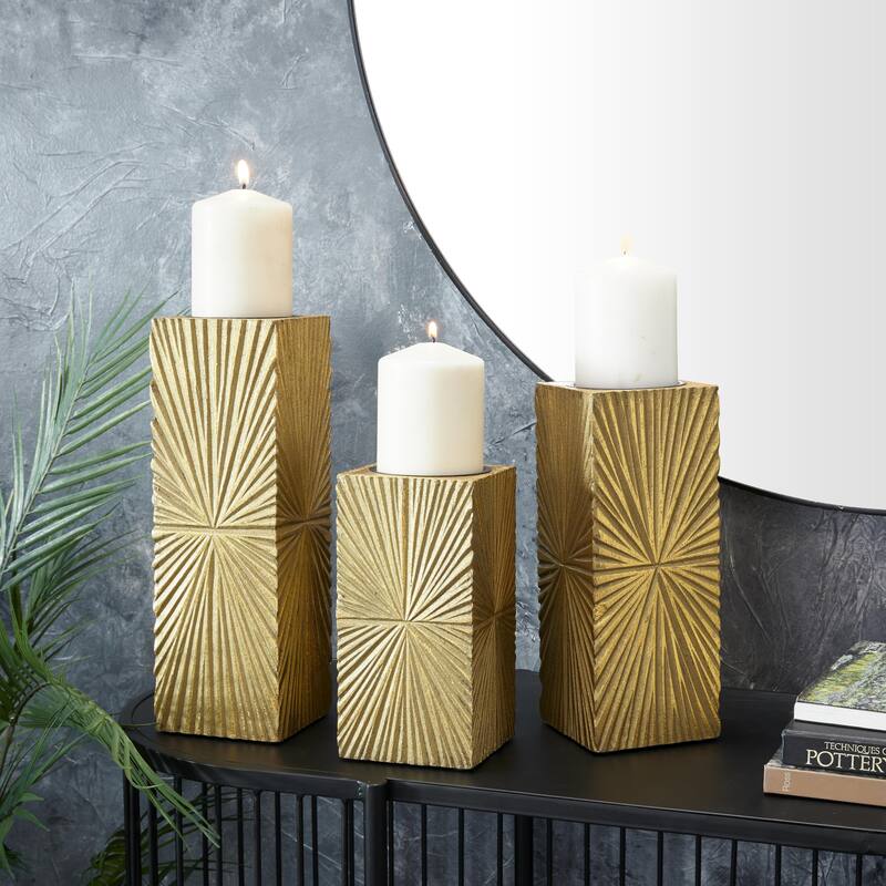 CosmoLiving by Cosmopolitan Gold, White or Black Wooden Carved Pillar Geometric Decorative Candle Holder (Set of 3) - Gold