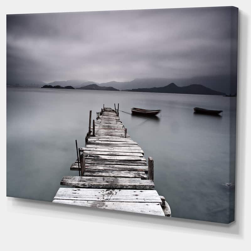 DesignArt "Pier and Boats at Seashore" Bridge and Pier Canvas Wall Art