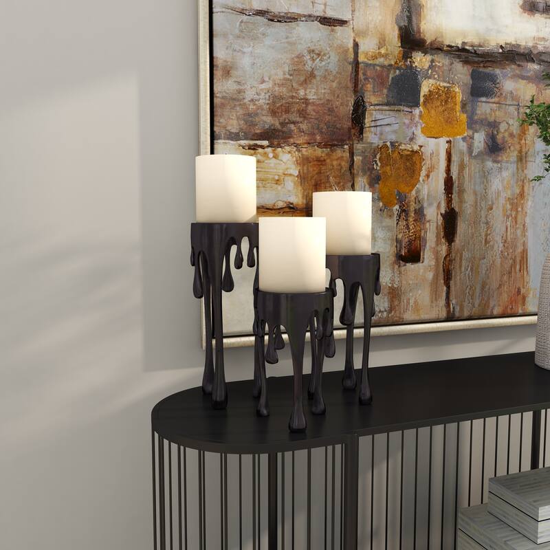 CosmoLiving by Cosmopolitan Silver, Gold or Black Aluminum Abstract Pillar Drip Candle Holder (Set of 3)
