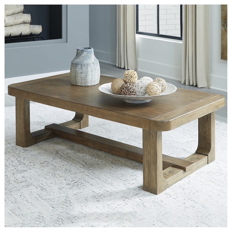 Signature Design by Ashley Cabalynn Light Brown Coffee Table - 56"W x 30"D x 17"H