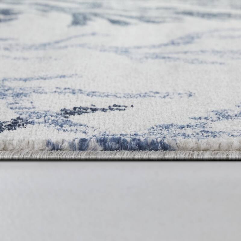 Kell Coastal Coral Print Area Rug