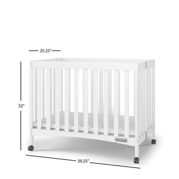 dimension image slide 1 of 4, Forever Eclectic London Folding Mini Crib - 39.25" L x 25.25" W x 32" H