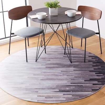 SAFAVIEH Faux Hide Machine Washable Slip Resistant Bohumila Modern Abstract Rug