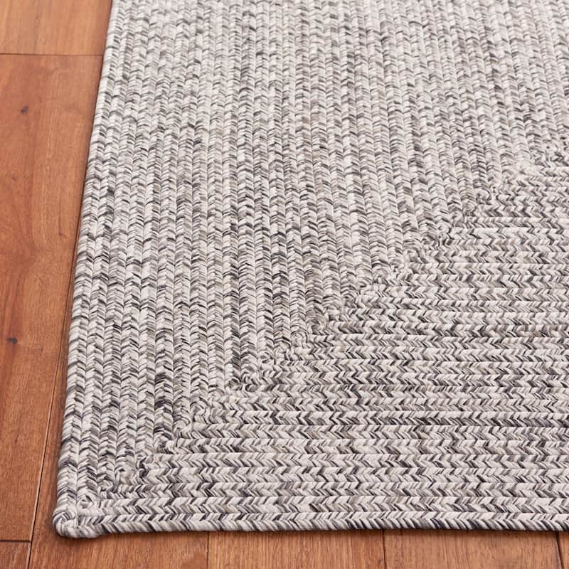 SAFAVIEH Handmade Braided Anthi Casual Rug