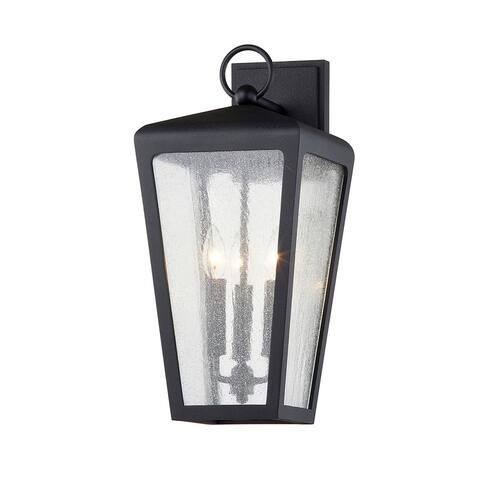 Mariden 1-light Textured Black Wall Sconce with Clear Seeded Glass