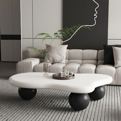 47 Inch Cloud Shaped Coffee Table with 3 Ball Legs