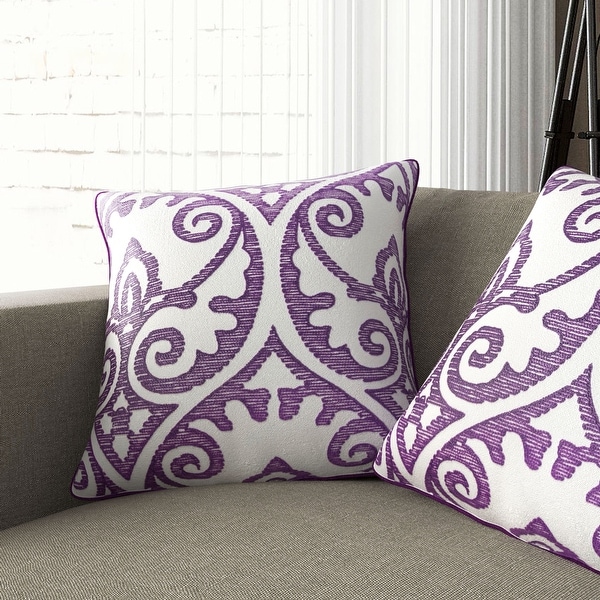 Purple and 2025 white pillows