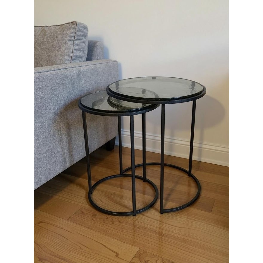 HomeRoots Set of Two Clear and Gunmetal Glass and Iron Round Frame Nested Tables - 18.5 in. x 22 in. x 18.5 in.