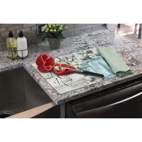 https://ak1.ostkcdn.com/images/products/is/images/direct/8d5e38ca7cbcaeb1281e31dbb16ee564d53bfcf8/Counter-Art-Glass-Cutting-Board---Counter-Saver-12%22x15%22%2C-Cotton-Boll.jpg?impolicy=medium