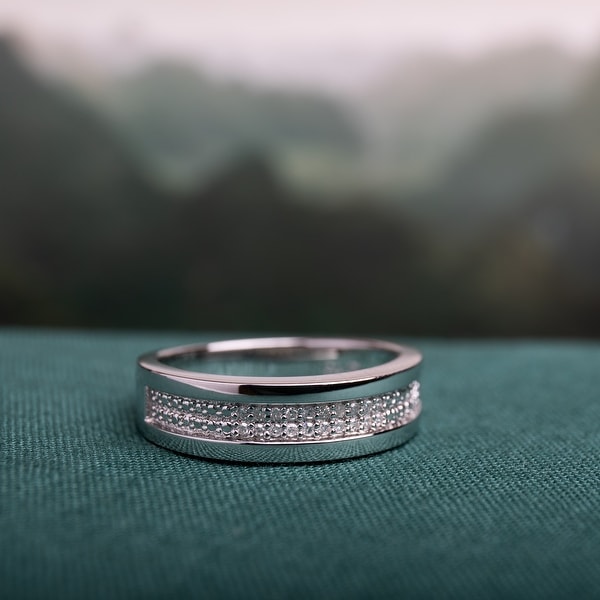1/10ct TDW Diamond Men's Wedding Band in Sterling Silver by Miadora. Opens flyout.