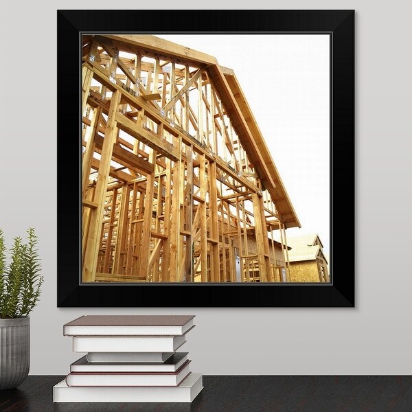 "Frame of house under construction" Black Framed Print