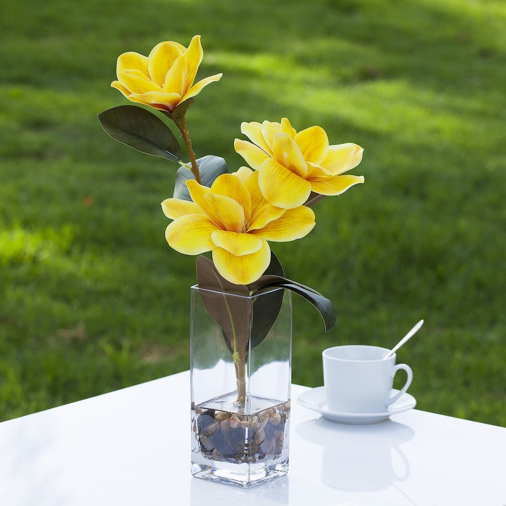 Enova Home Artificial Real Touch Magnolia Faux Flowers Arrangement in Rectangle Glass Vase with Faux Water and River Rock