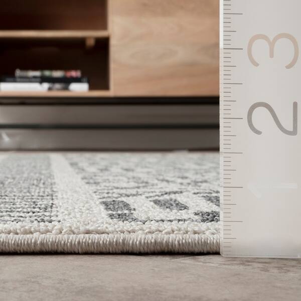 dimension image slide 1 of 2, nuLOOM Tribal Geometric Trellis Area Rug with Tassel
