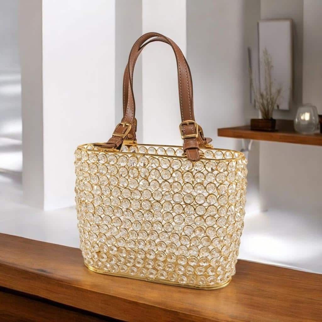 HomeRoots 11" Clear And Gold Faux Crystal And Metal Handbag Shaped Magazine Holder - Product