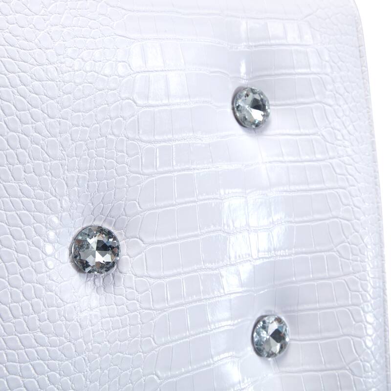 A set of 4 white and black vintage crocodile leather cushioned dining chairs, featuring crystal clasp design and leather