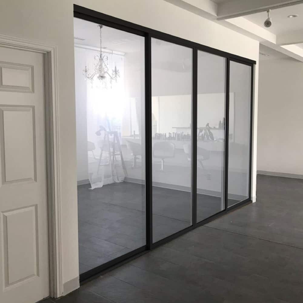 THE SLIDING DOOR COMPANY 4 Panel, sliding room divider, Clear Glass and Aluminum Frame on double track.