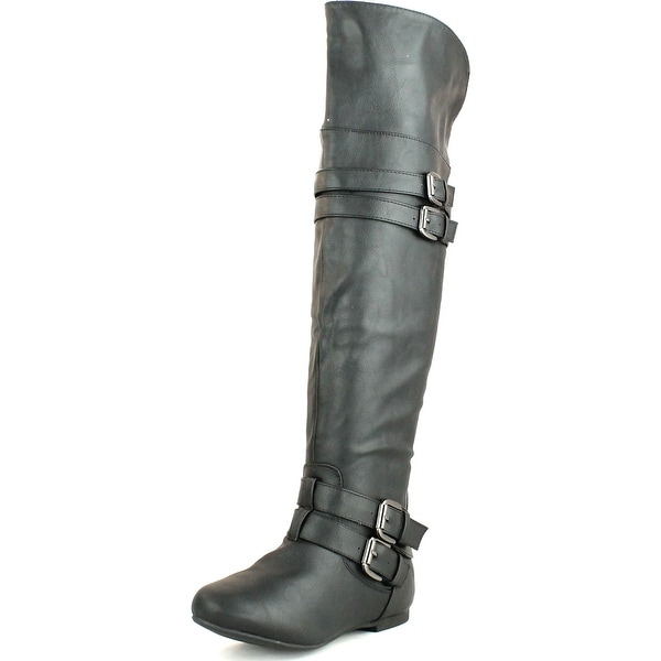 black flat boots with buckles