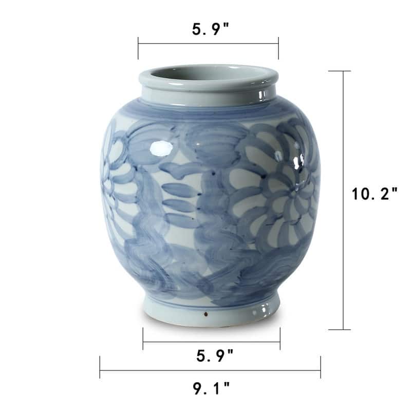 Approx. 10 Inches Tall Blue and White Vase with Flower Motif