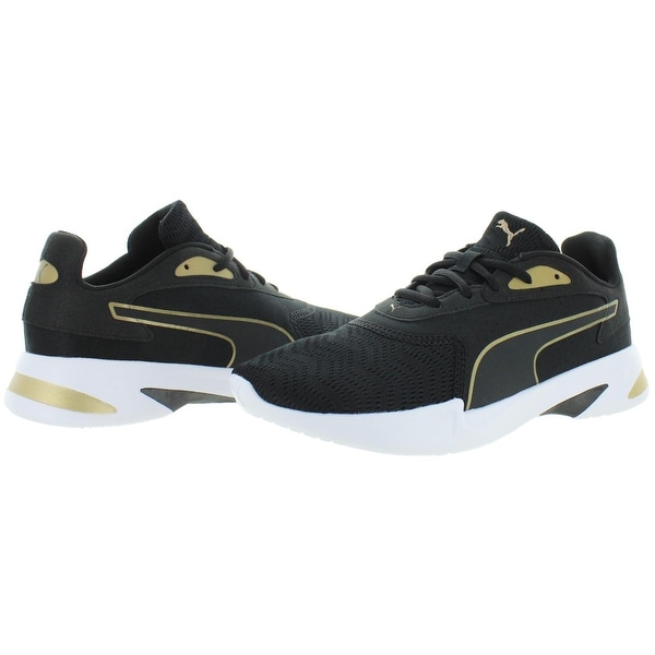 gold and black puma shoes