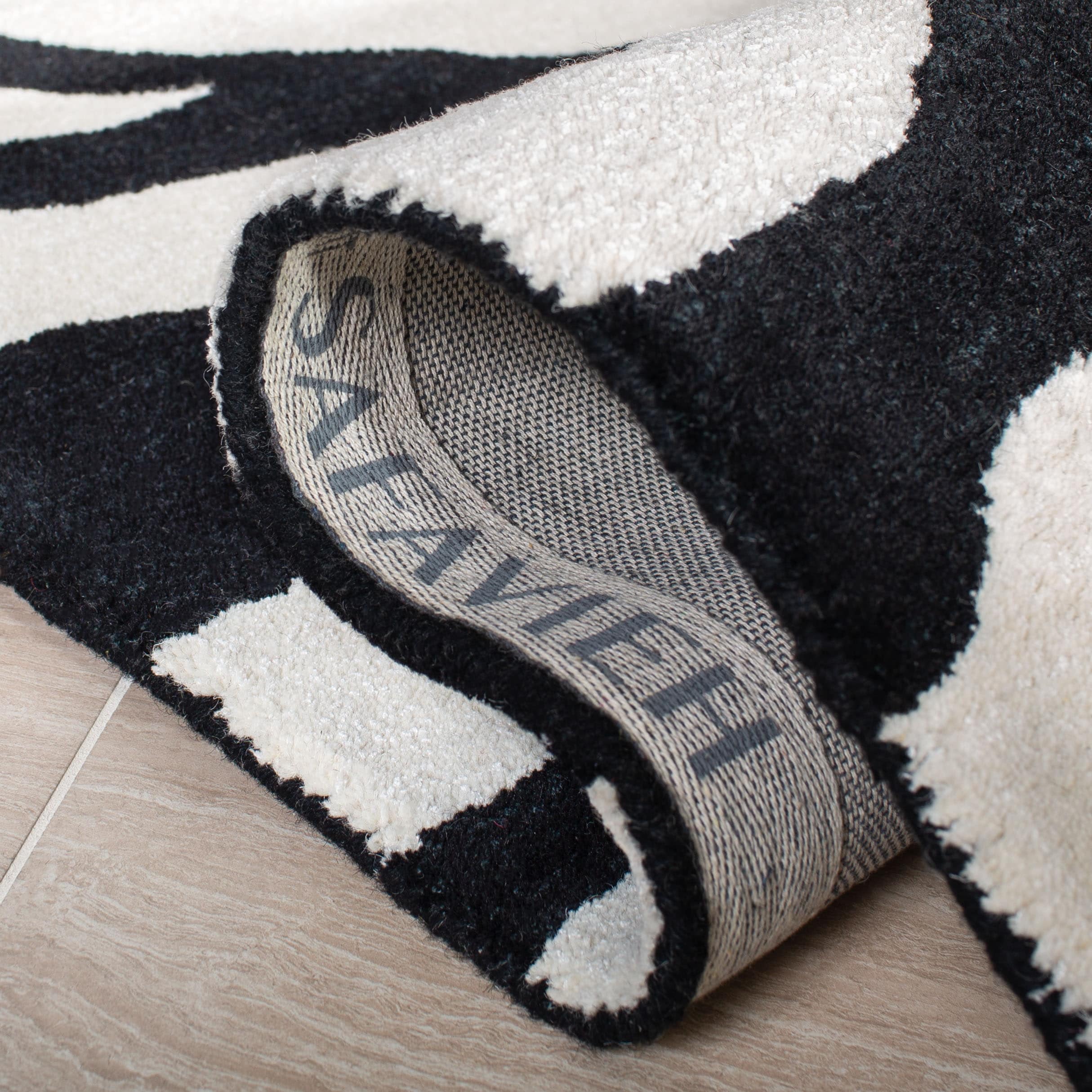 SAFAVIEH Handmade Soho Kasandra Zebra N.Z. Wool Rug - On Sale