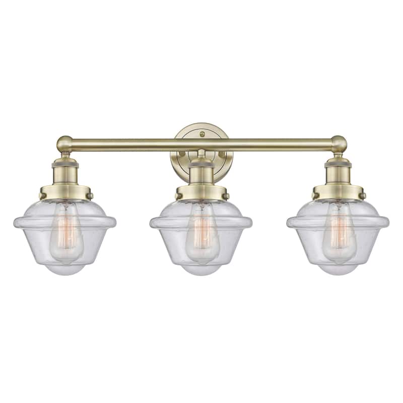 Innovations Lighting 616-3W-10-25 Oxford Vanity Oxford 3 Light 25" - Antique Brass / Seedy