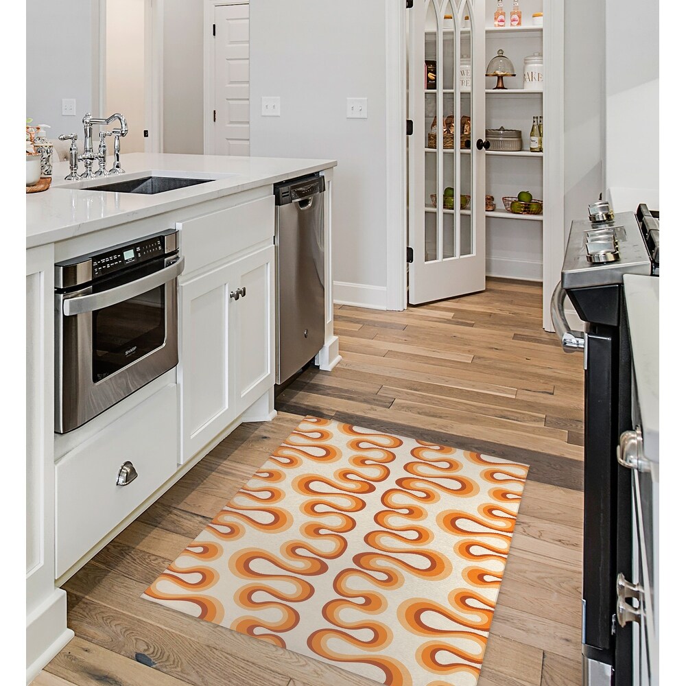 https://ak1.ostkcdn.com/images/products/is/images/direct/8ec84fd7e1c384fd26ea5f7745344d3448957779/GROOVY-STRIPE-ORANGE-Kitchen-Mat-By-Becky-Bailey.jpg