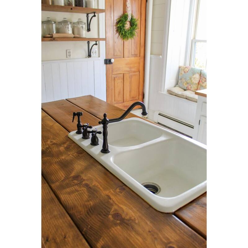 Kingston Brass Heritage 8-Inch Widespread Kitchen Faucet with Brass Sprayer