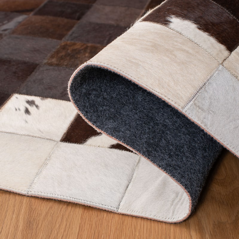 SAFAVIEH Handmade Studio Leather Haley Natural Hide Leather Rug