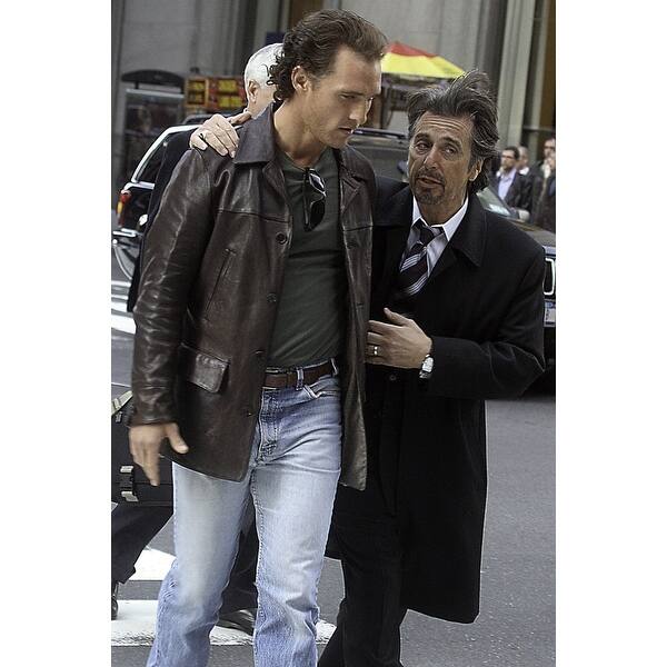 A film still of Al Pacino and Matthew McConaughey walking across a