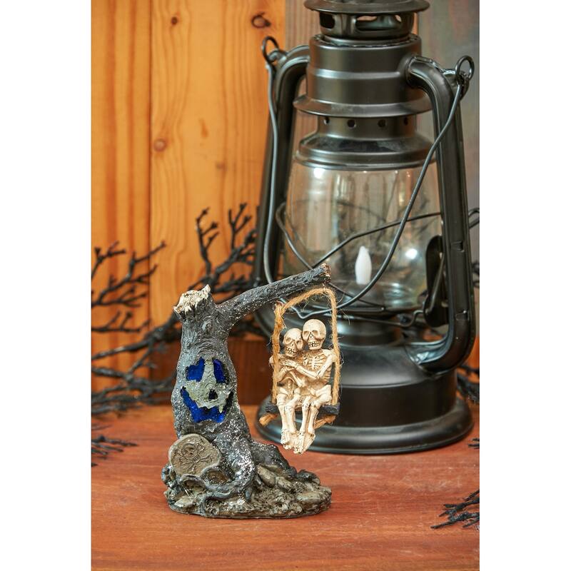 Light-Up LED Haunted Halloween Tree Swing with Skeleton Couple Figure Decoration