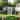 Roomfitters 10x8 ft Metal Storage Shed Outdoor Backyard Garden House Planter Box Window Double Door Utility Shed