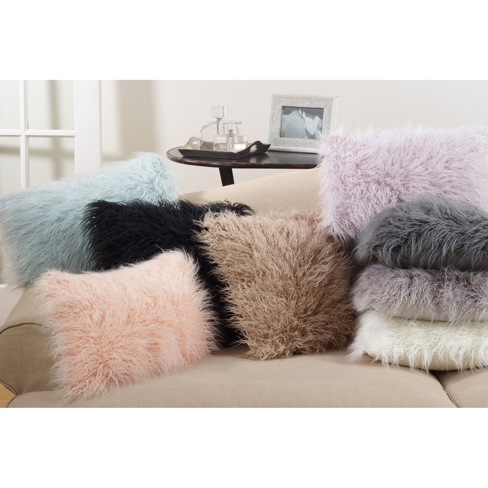 https://ak1.ostkcdn.com/images/products/is/images/direct/8f3346bf57241d5a6992535302d984c5b8640863/Mongolian-Faux-Fur-Throw-Pillow.jpg