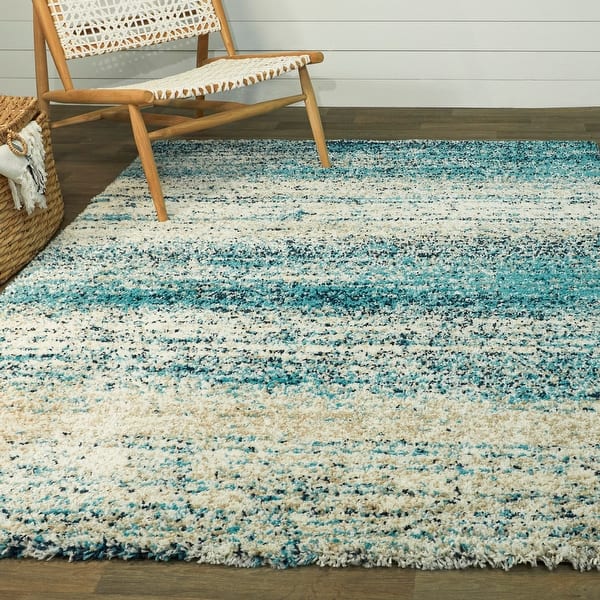 https://ak1.ostkcdn.com/images/products/is/images/direct/8f36abff5ef7f5adb92e579289daa83a4de325f2/Eastleigh-Abstract-Shag-Area-Rug.jpg?impolicy=medium