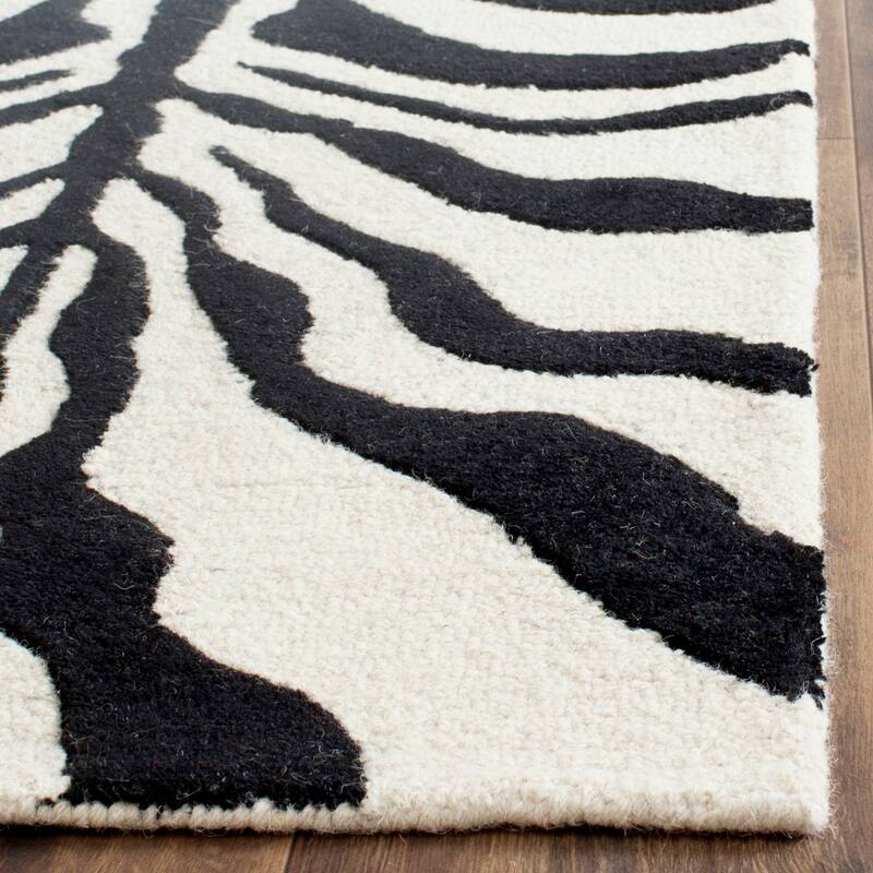SAFAVIEH Handmade Cambridge Salina Animal Print Wool Rug