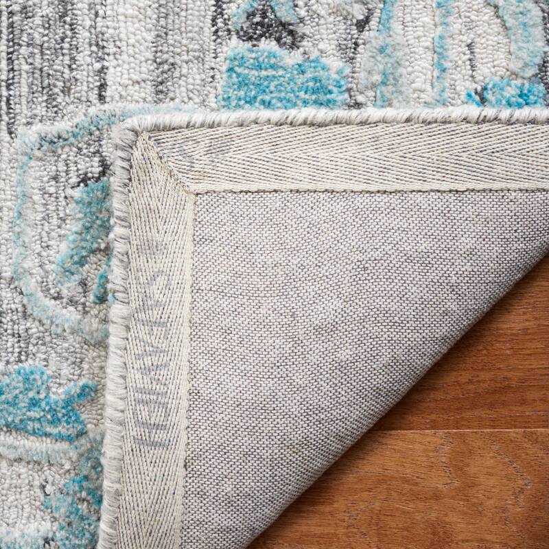 SAFAVIEH Handmade Marquee Two Color Braid Modern Rug