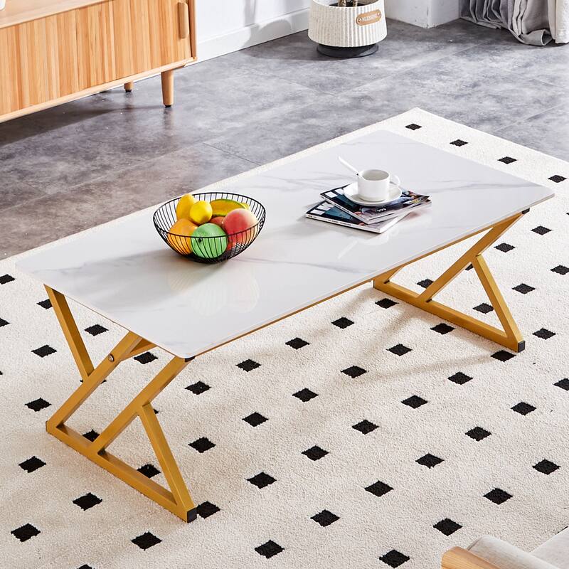 A modern minimalist style marble patterned coffee table with golden metal legs Computer desk Game table Tea table