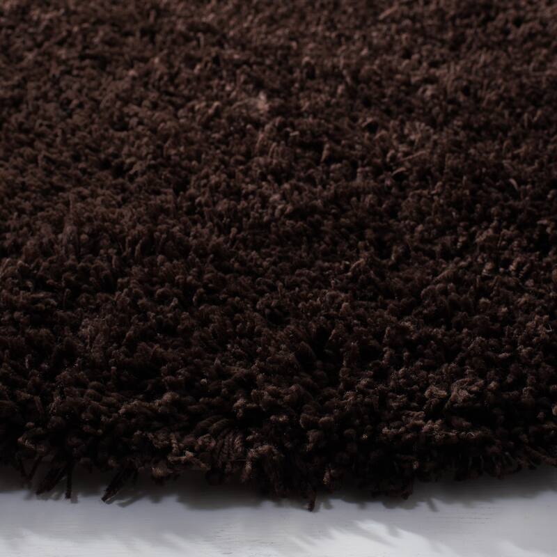 SAFAVIEH Handmade Classic Shag Nakhshun Rug