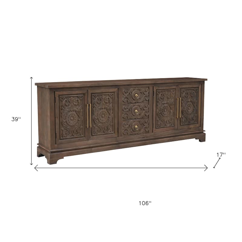 HomeRoots 106" Brown Distressed Solid Wood Carved Floral Three Drawer Sideboard with Four Doors