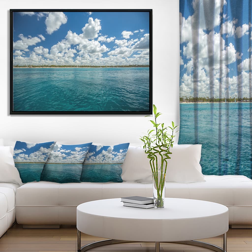 Designart "White Fluffy Clouds Over Sea" Oversized Beach Framed Canvas Artwork Print