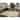 Signature Design by Ashley Mortis Beige/Black 5' x 7' Rug - 5'W x 7'D