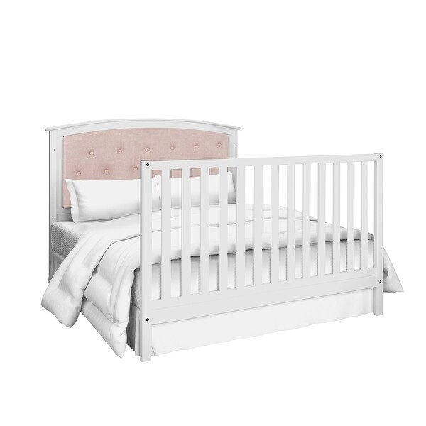 grey tufted crib