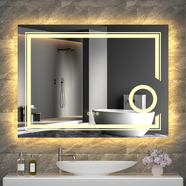 Bathroom mirror with lights and magnifier outlet