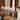 10-Light Industrial Farmhouse Linear Candle Chandelier with Cylinder Clear Glass Shade